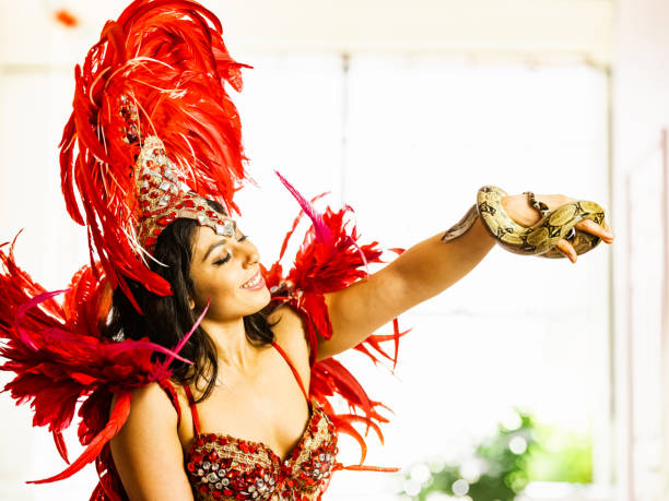 istock Carnival woman with pet snake 1320176467