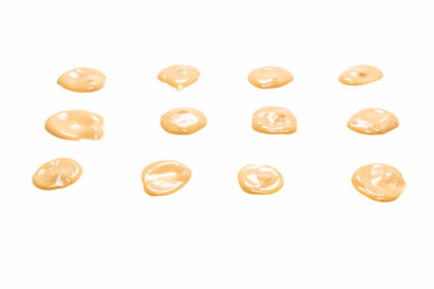 istock Mushroom sauce splashes isolated on white background. 1320177564