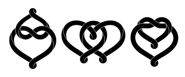 Set of signs of the union of two hearts made of intertwined mobius stripes. Stylized symbols of eternal love for tattoo design. Vector isolated illustration. Set of signs of the union of two hearts made of intertwined mobius stripes. Stylized symbols of eternal love for tattoo design. Vector illustration isolated on white background. celtic knot symbol of eternal love stock illustrations