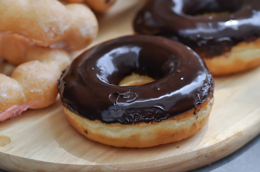 donut, doughnut or chocolate in the tray