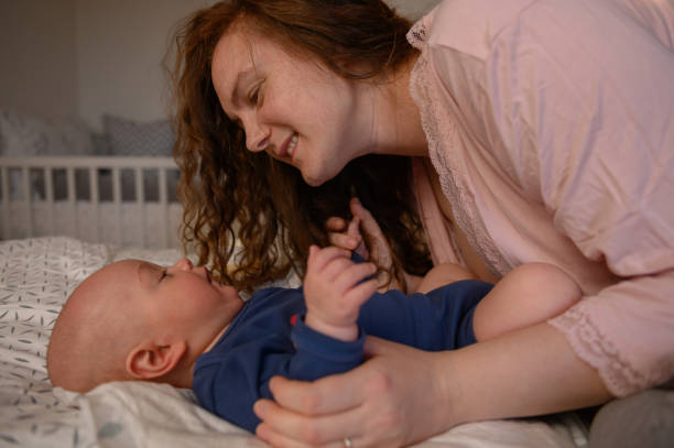 istock Mother playing and bonding with her baby 1320182176