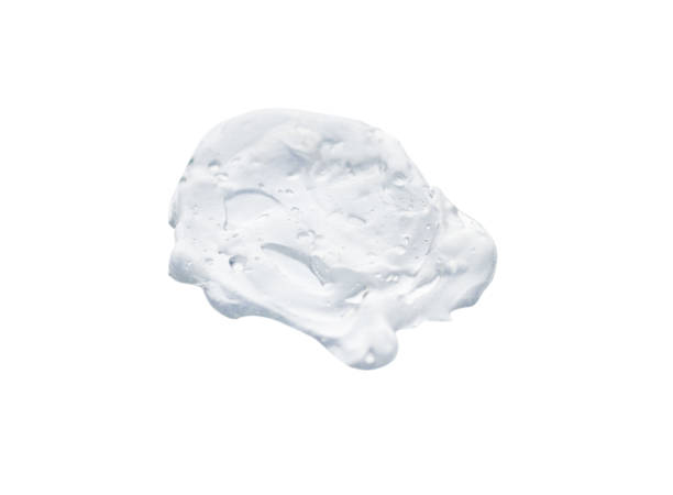 istock Swatch texture of white translucent cream with bubbles isolated on a white background. 1320183282