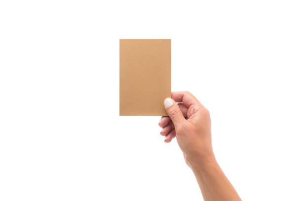 白い上に分離された空白の茶色のカードを持つ指 - palm people white brown ストックフォトと画像