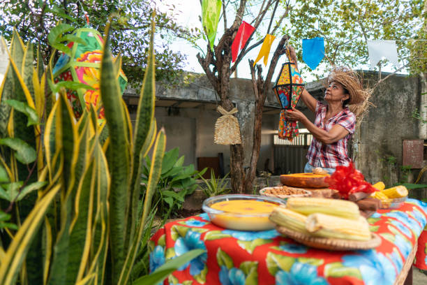 Woman decorating festa junina in the backyard
