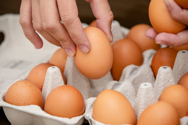 istock Brown and organic chicken egg tray on the table. 1320190691