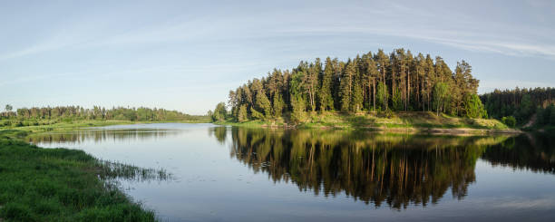 istock Beautiful river bend and forests on a sunny spring day 1320191111