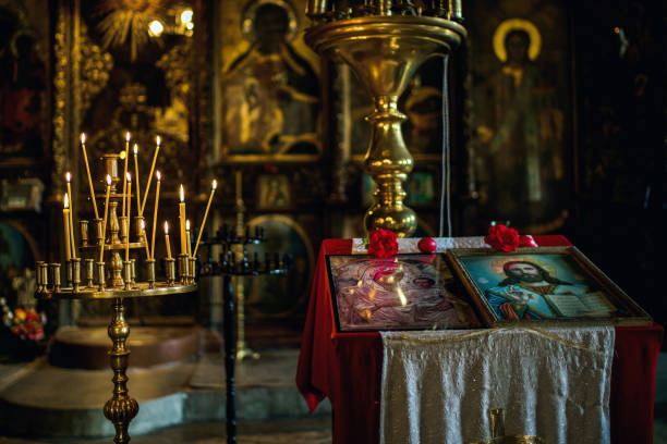 istock Horizontal view of a orthodox icon decorated with red flowers 1320194979