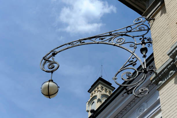 Decorative hanging street lantern mounted on the wall of Kyiv Opera House in Ukraine