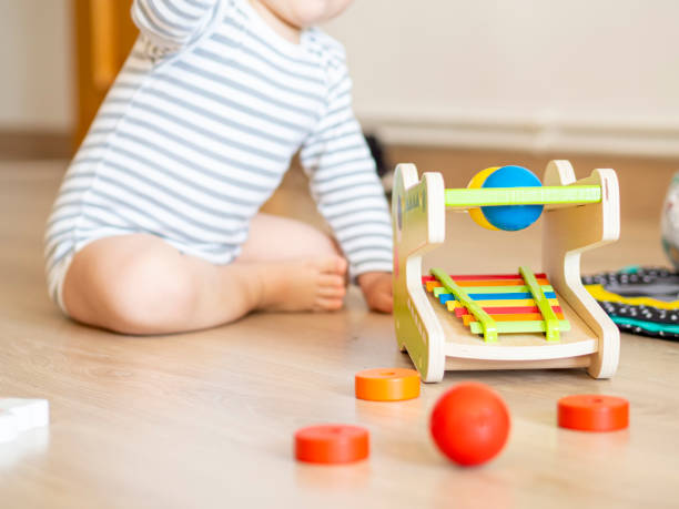 istock Baby at home playing games for early development. 1320198806