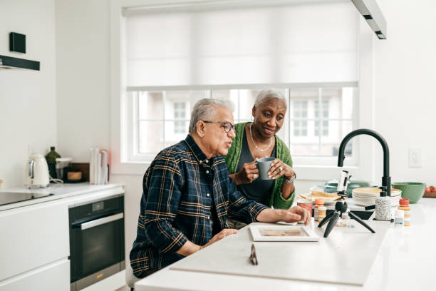istock Senior couple communicating online 1320199642
