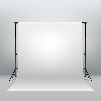 White Backdrop Background for Photography Photo Booth Backdrop for Photoshoot Background Screen Video Recording Parties Curtain. Professional photo studio interior. Photography tripods and racks.