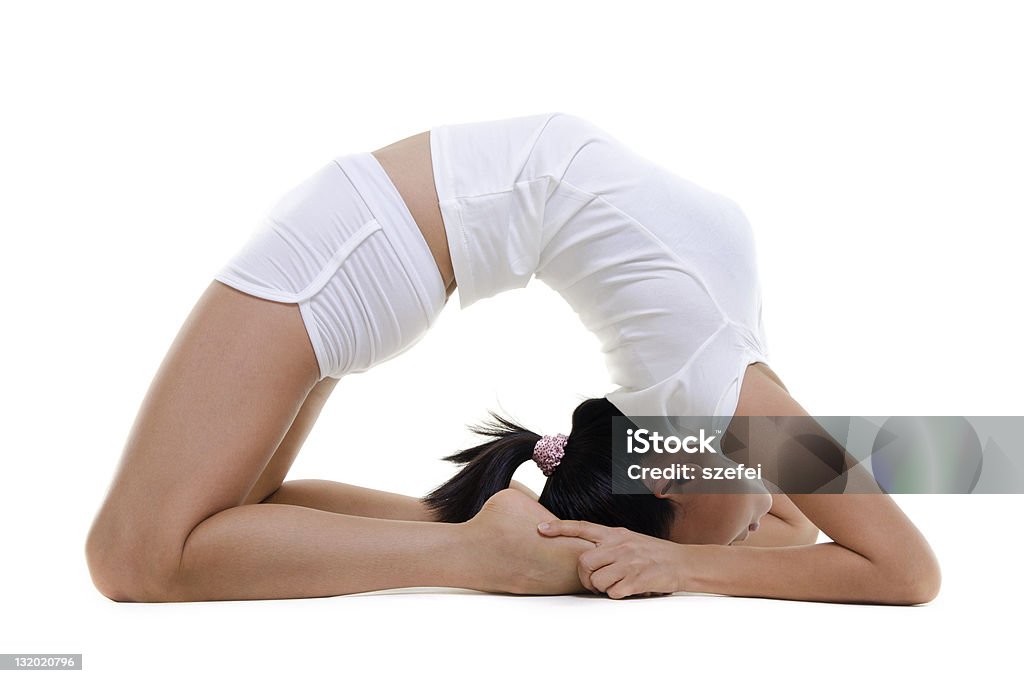 Yoga Posture Woman in yoga, Pigeon Posture (Kapotasana), on white background 20-29 Years Stock Photo