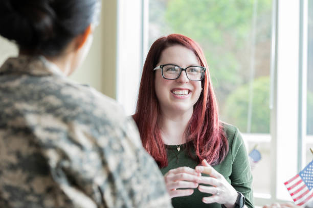 istock Financial planner meets with veterans to discuss investment options 1320208620