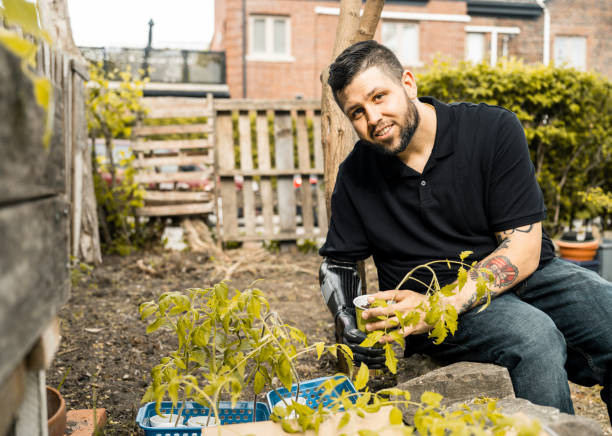 istock Amputee urban gardener 1320209223