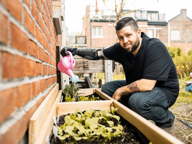 istock Amputee urban gardener 1320209318
