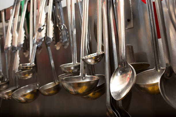 istock hanging ladles and spoons 1320212360