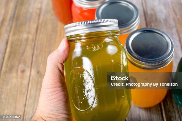 Hand Holds Mason Stock Photo - Download Image Now - Pickled, Juice - Drink, Jar
