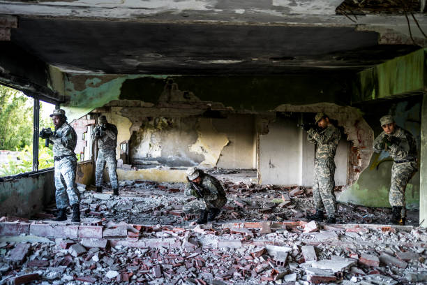 istock Soldiers in a tactical position 1320217813