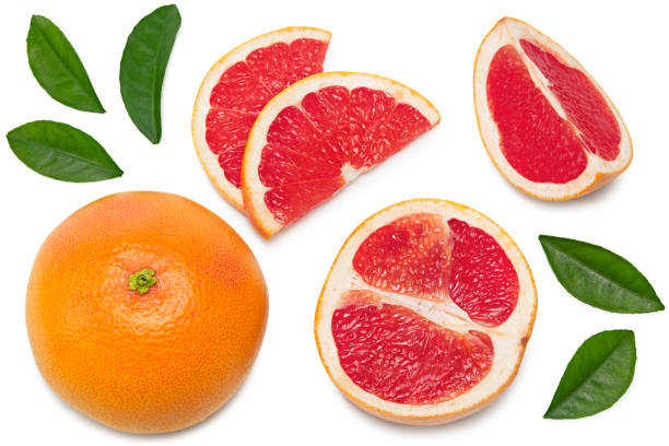 istock grapefruit with slices and green leaves isolated on white background top view. clipping path 1320218209
