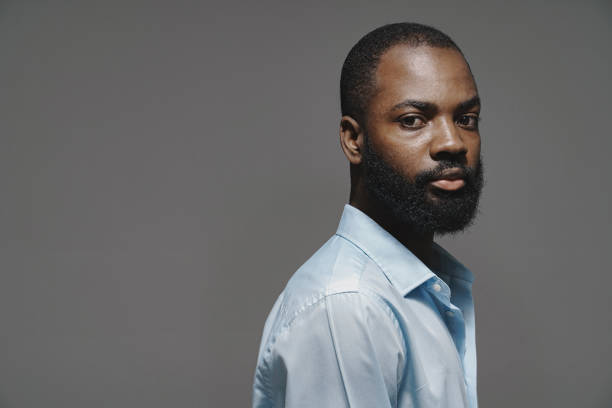 istock Close up portrait of a handsome young black man 1320218883