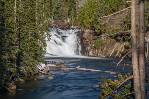 Lewis falls in southern Yellowstone National Park using a long exposure. This is in Wyoming in the western part of the USA.