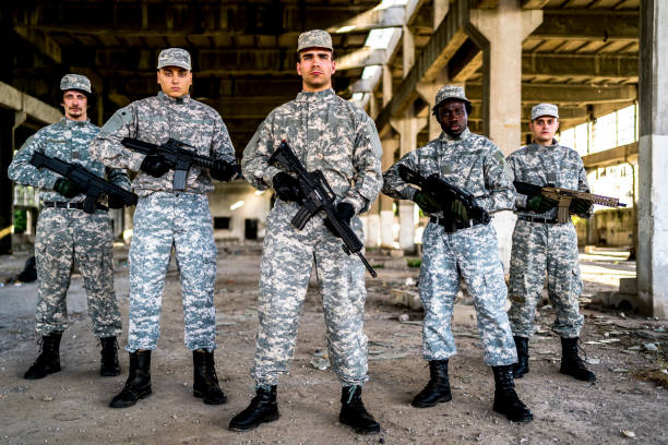 istock Soldiers with shotguns 1320219192
