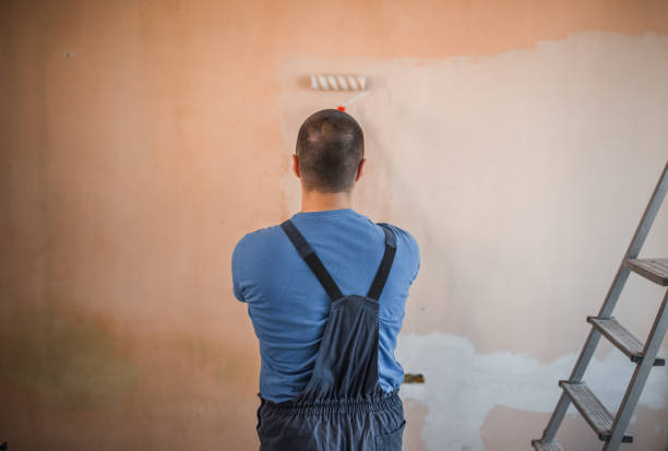 istock Photo of attractive painter from the back 1320219260