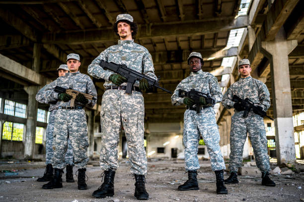 istock Soldiers with shotguns 1320219436