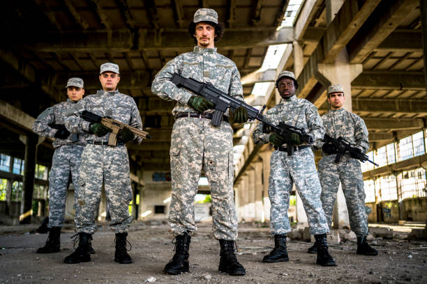 istock Soldiers with shotguns 1320219893
