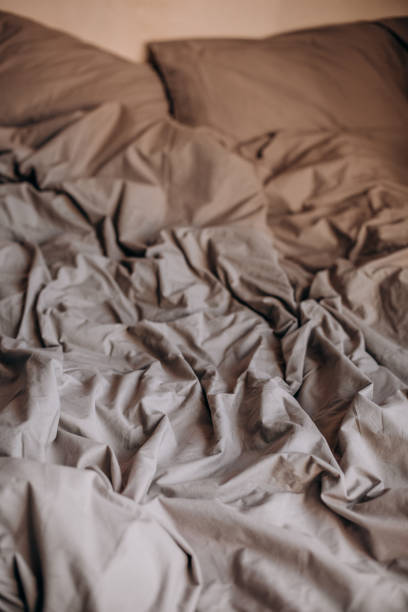 istock morning bed ruffled sleep wrinkled textile blanket 1320221322