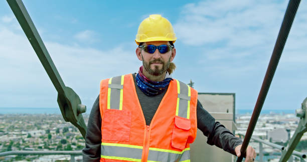 istock Portrait of A Construction Worker Atop A Crane 1320223553