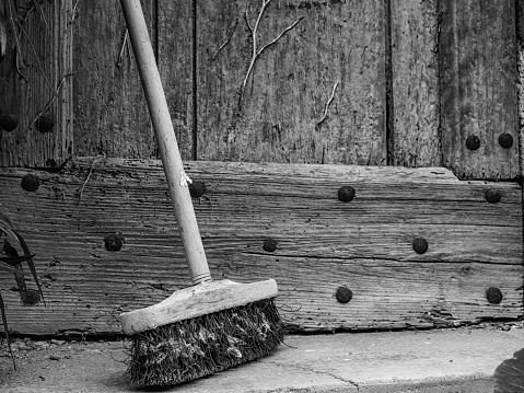 Old broom in black and white
