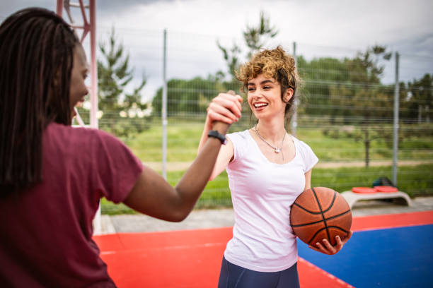 istock Girls playing basketball 1320226372
