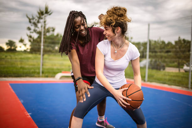 istock Smiling basketball players 1320227737