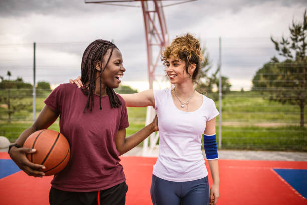 istock Smiling basketball players 1320227760