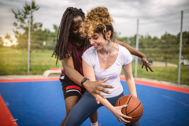 istock Smiling basketball players 1320227808