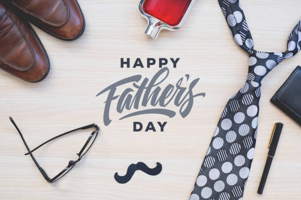 istock Fathers day. Greetings and presents on table. 1320229283