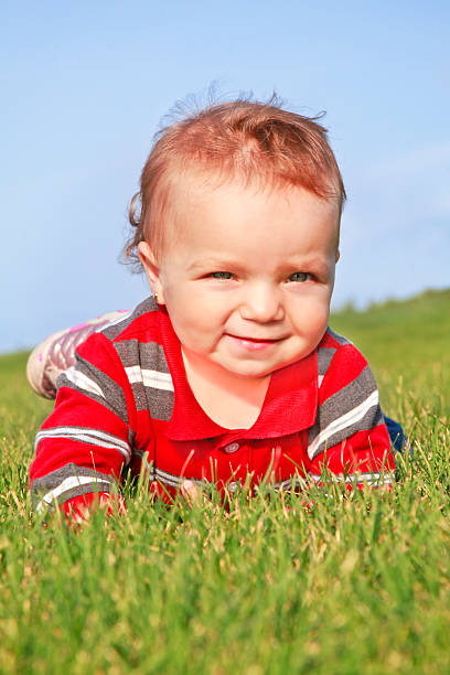 istock Baby girl crawling on the grass 132023145