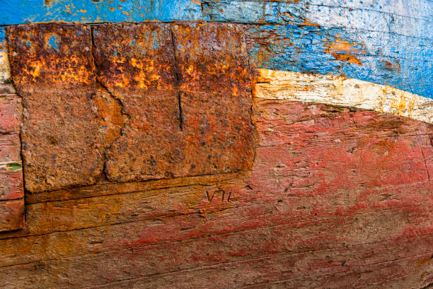 Working fishing boat moored at high tide, Barry Island, south Wales UK