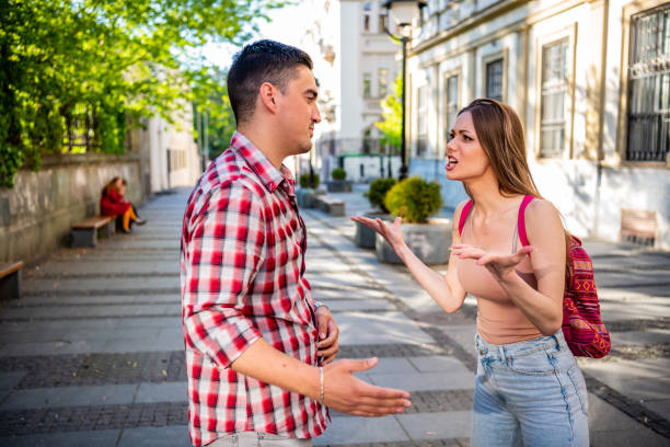 istock Young couple arguing at the street , relationship problems 1320234808