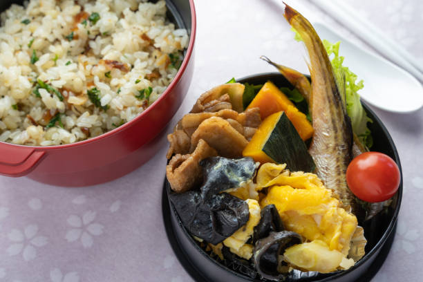 istock Made egg & wood ear lunch for my wife (round, cherry blossoms background) 1320236739