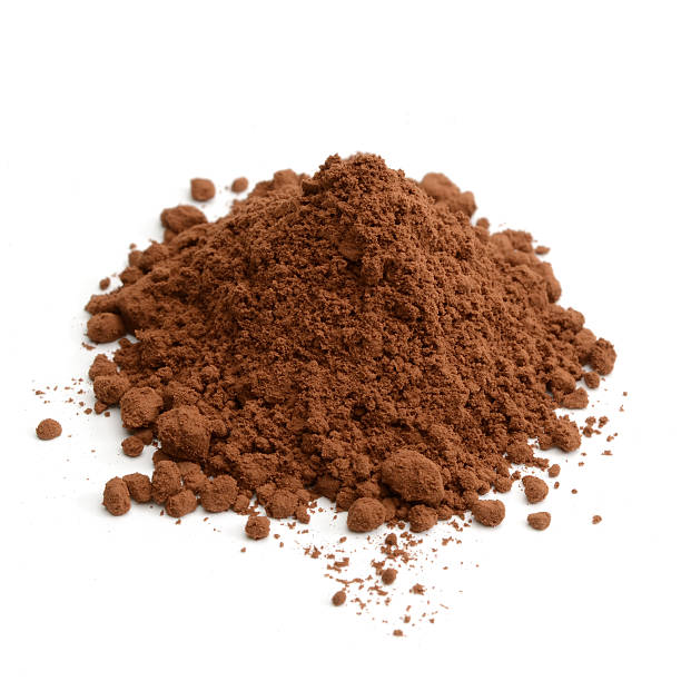 istock Pile of cocoa powder on white background 132023864