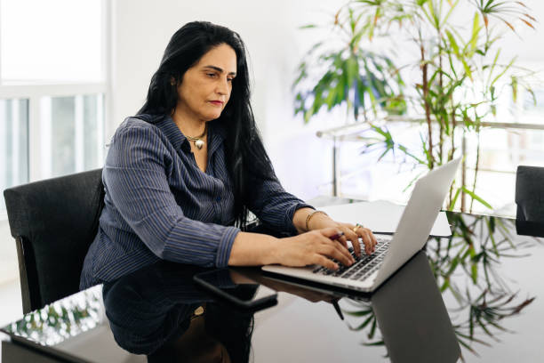 istock Businesswoman using laptop 1320245330