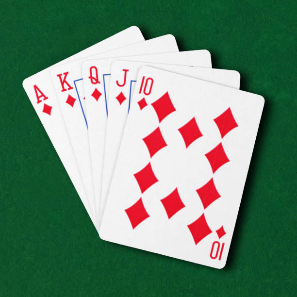 istock Diamonds royal flush flat on green card table winning hand business concept 1320246876