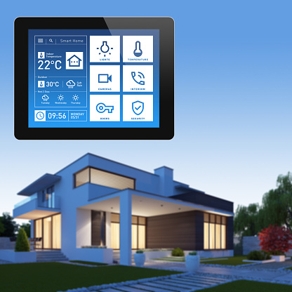 Smart home device touch screen panel with concept design. Celsius system. Modern home in the background.