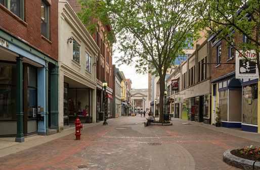 Schenectady, NY - USA - May 22, 2021: Landscape view of the Jay Street Pedestrian Mall, lined with quaint specialty shops, boutiques, galleries and eateries.