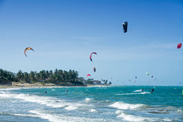 Kiteboarders at Cabarete beach Kiteboarders at Cabarete beach. Dominican Republic kite sailing stock pictures, royalty-free photos & images