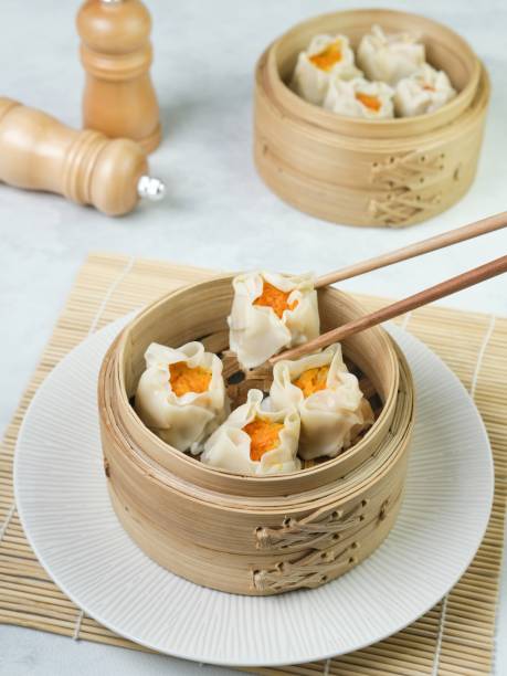 istock Dim sum, Chinnese food in bamboo steamer. 1320253977