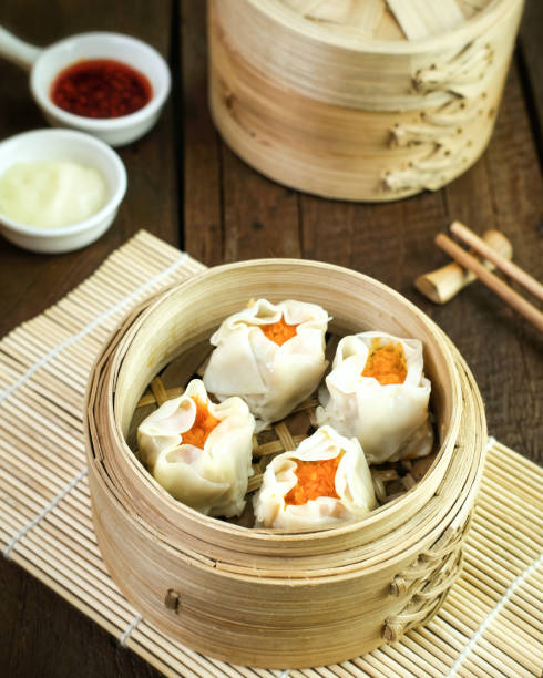 istock Dim sum, Chinnese food in bamboo steamer. 1320253986
