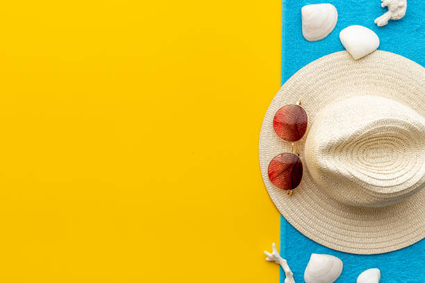 istock Frame of beach accessories with sraw hat, sunglasses and flip flops 1320254806